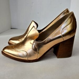 The office of Angela Scot Elegant Rose Gold Metallic Heels